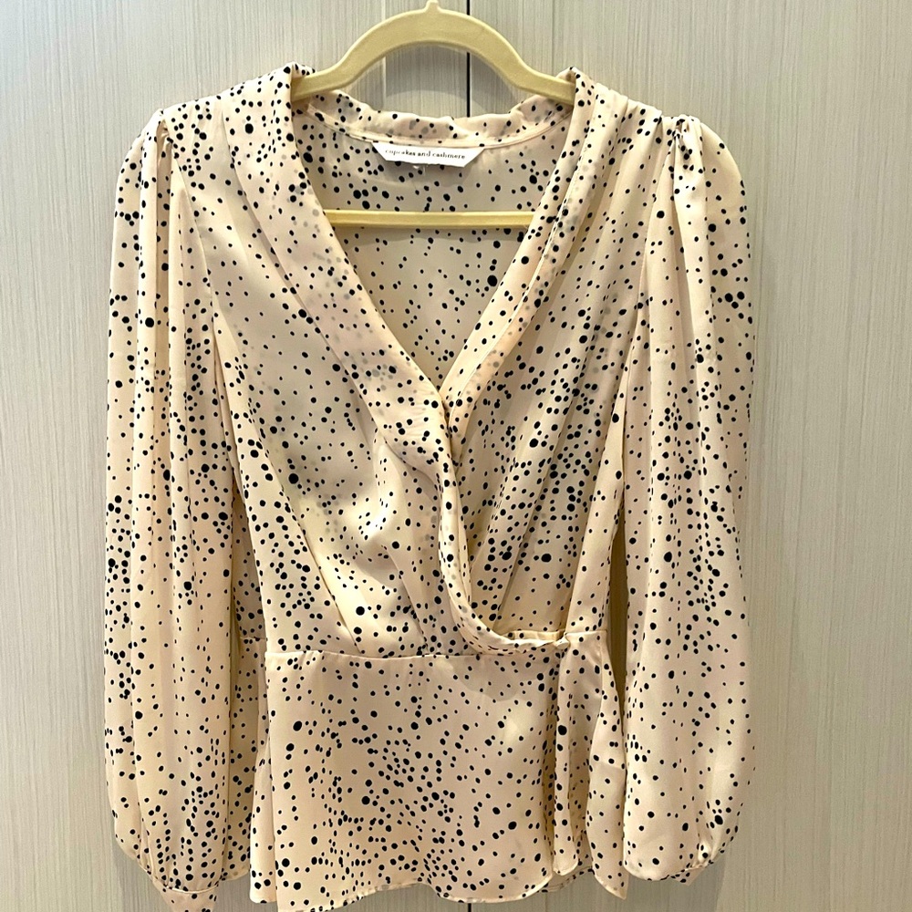 Cupcakes and cashmere brand peplum silk top.